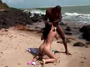 Interracial sex on the beach